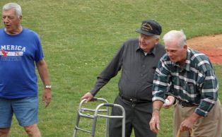 Three former North Atlantic League players, Lee Saverio, Art Bustard and John Rothenhausler, throw out opening pitches as Blazers celebrate the 65th anniversary of the NAL